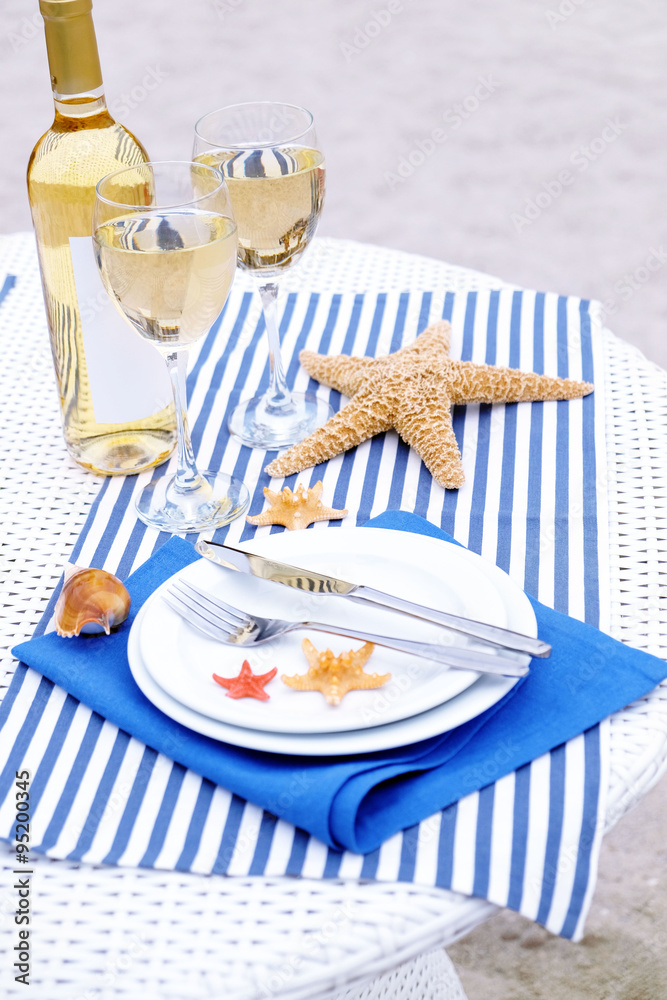 Table setting decorated in marine style