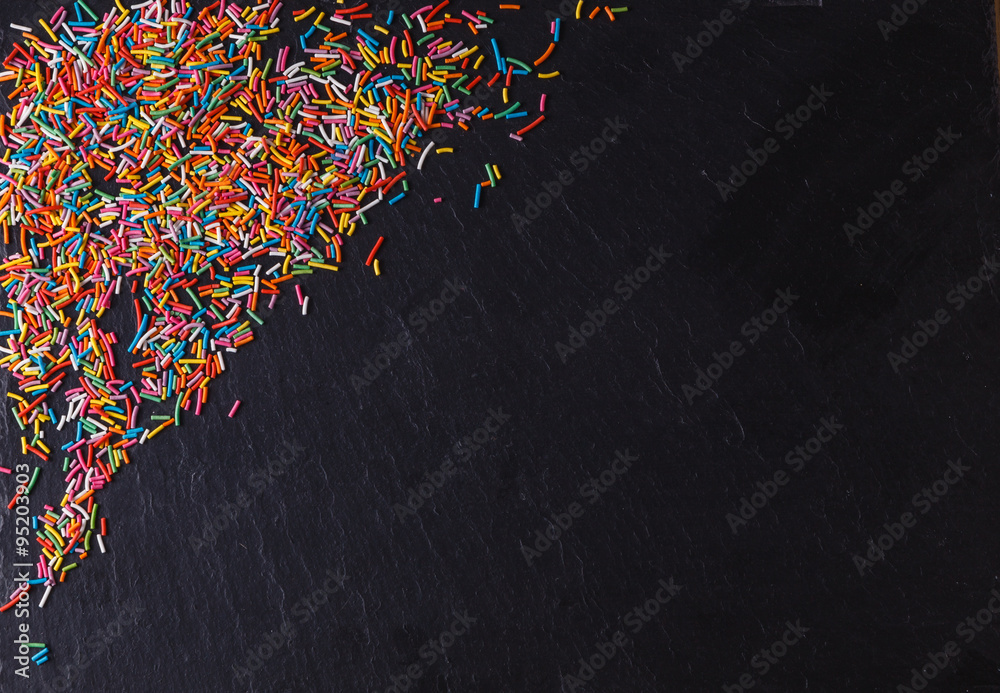 Fototapeta premium Fun sweet frame on slate black background