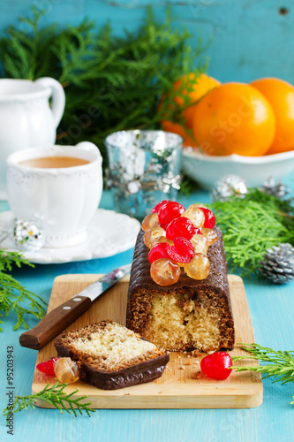 Chocolate cake with candied fruit for Christmas.