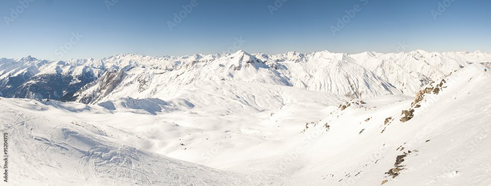Fototapeta premium View of a snowy mountain valley