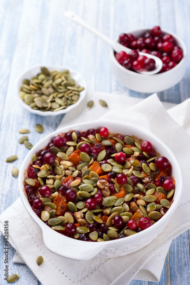 Millet pumpkin gratin with cranberries, walnuts and pumpkin seeds Millet pumpkin gratin with cranberries, walnuts and pumpkin seeds
