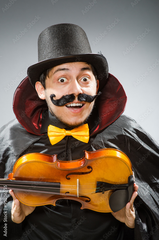 Funny violin player wearing tophat Funny violin player wearing tophat