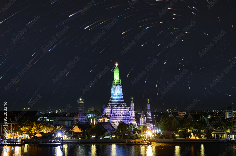 Grand palace and wat arun at twilight  stars Thailand.