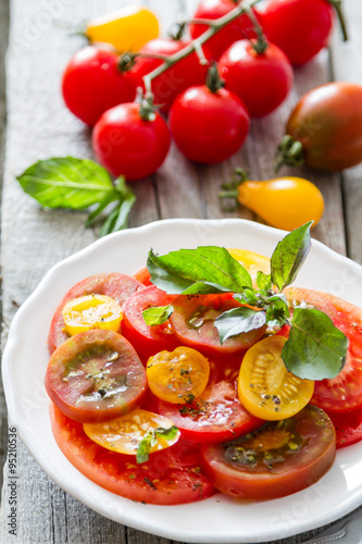 Colorful tomato salad basil 