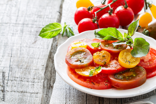Colorful tomato salad basil 
