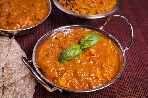 Chicken Tikka Masala Curry on Rattan Background
