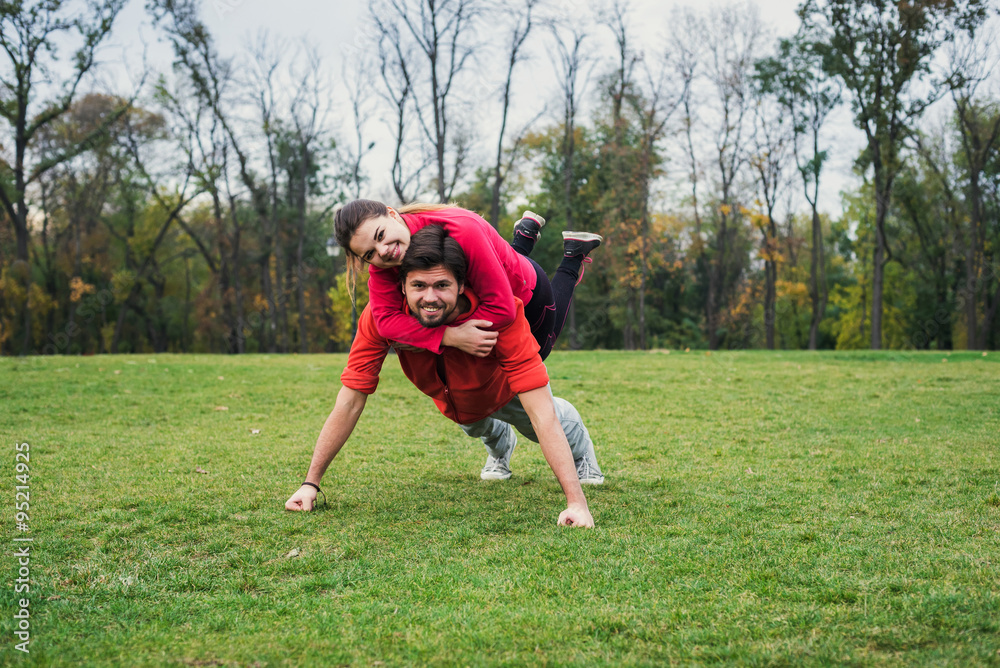 young sporty couple working out together outdoors young sporty couple working out together outdoors