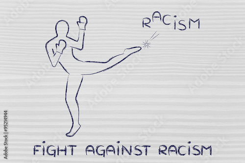 person kicking and boxing the word racism photo