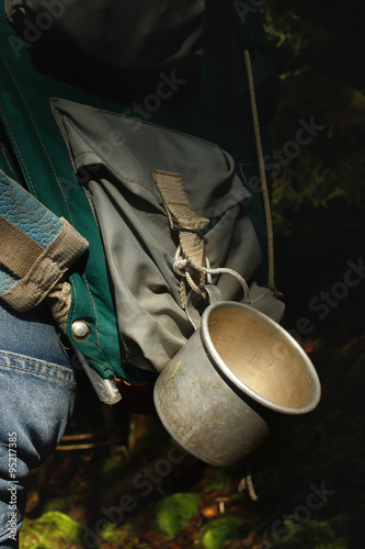 travel aluminium cup in forest sunlight photo