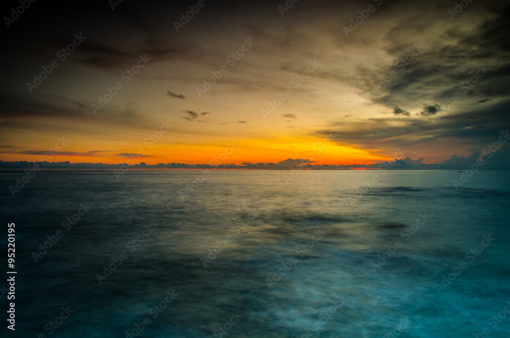 beautiful nature  sunset on  moody sea background: soft focus