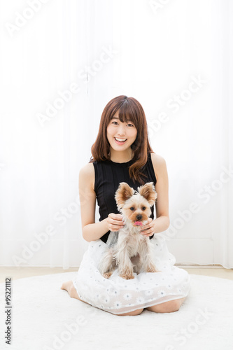 young asian woman with dog