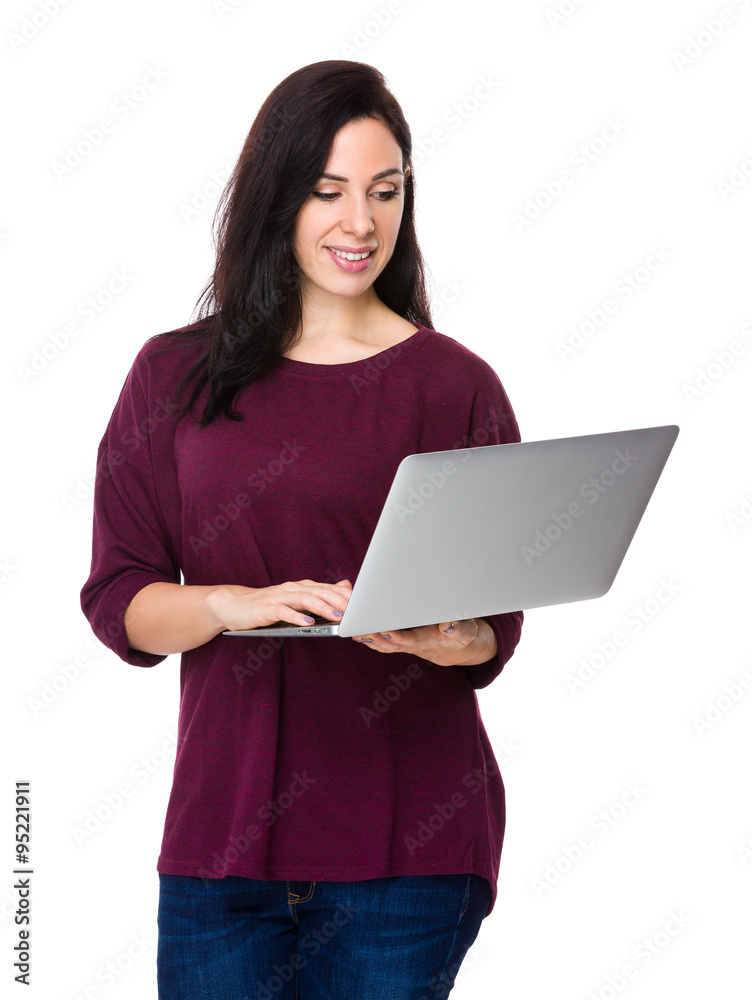 Brunette woman use of the notebook computer Brunette woman use of the notebook computer