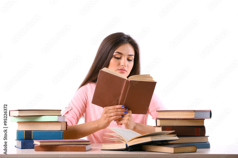 Young girl reading book isolated on white Young girl reading book isolated on white