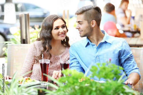 attractive couple have lunc...