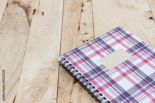 Fabric plaid texture cover spiral notebook.