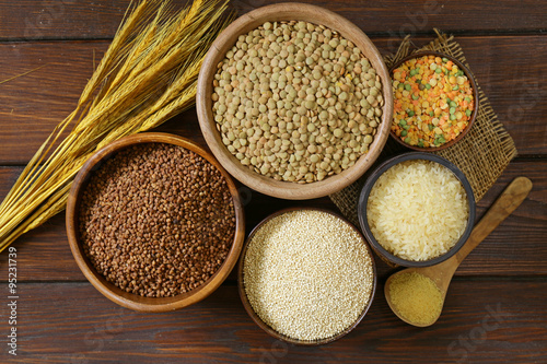 assortment of different grains - buckwheat, rice, lentils, quinoa photo