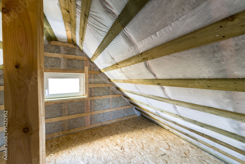 Attic with vapor barrier and window