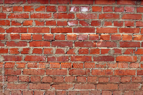 Red surface of brick wall background - part of modern building