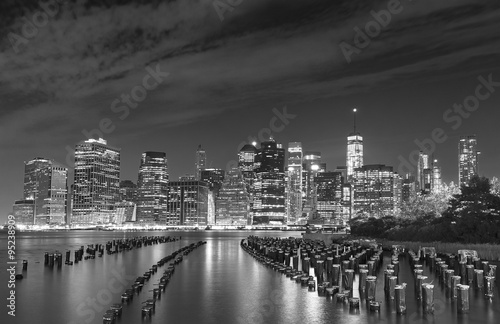 Black and white photo of Manhattan waterfront at night  NYC  USA