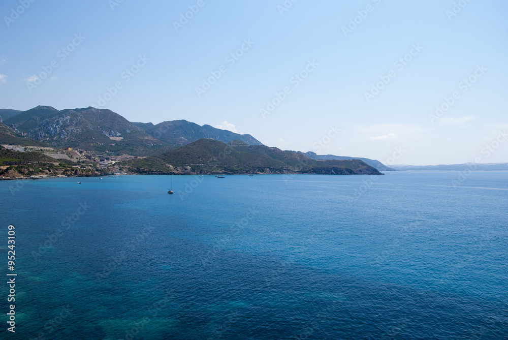 Coastal Landscape. Masua's sea stack daily in summertime (Sardinia - Italy)