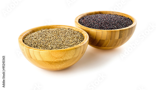Bamboo bowls with cumin seeds, black mustard seeds