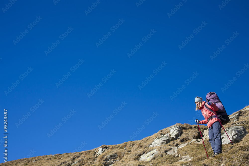 The girl with the backpack.