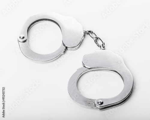 Handcuffs on white background