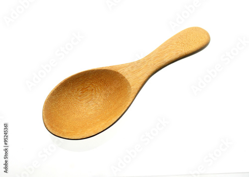 Wooden spoon on White background photo