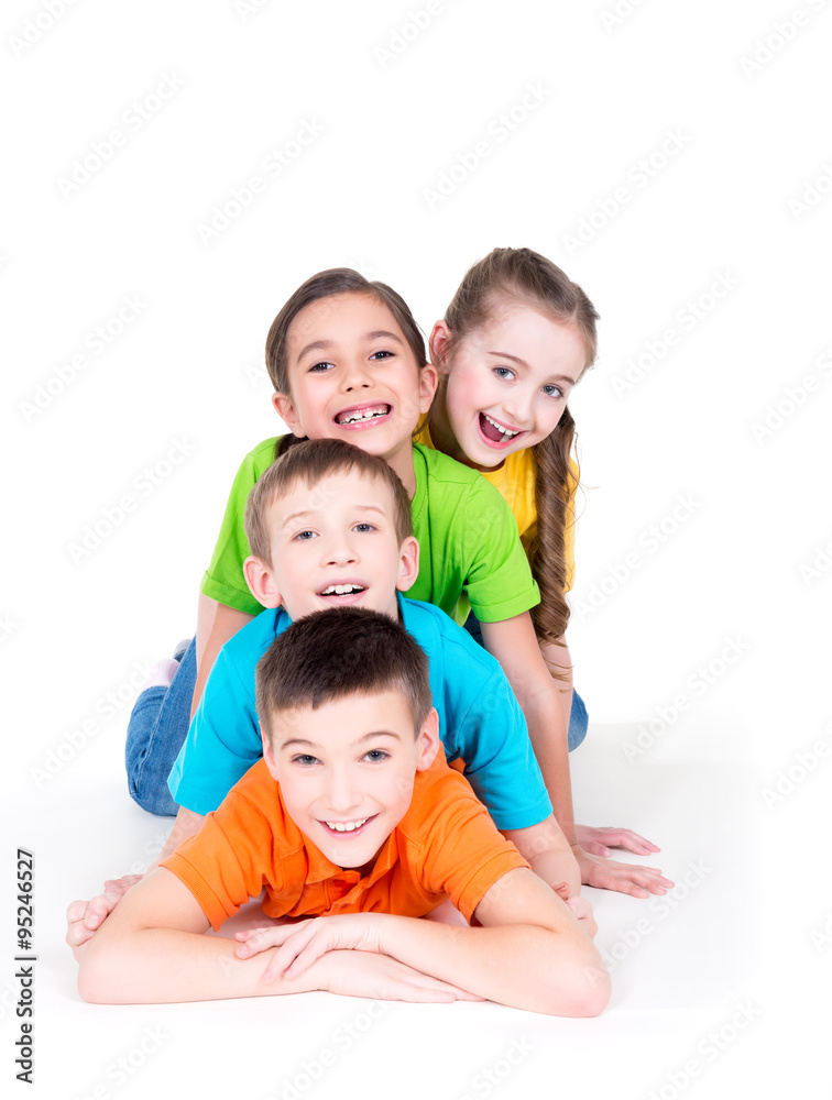 Five beautiful kids lying on the floor.