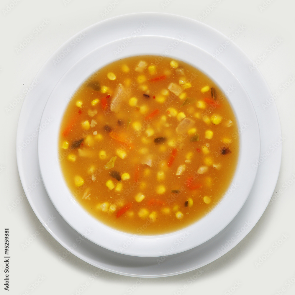 Bowl of homemade chicken and sweetcorn soup made with fresh wholesome ingredients Bowl of homemade chicken and sweetcorn soup made with fresh wholesome ingredients