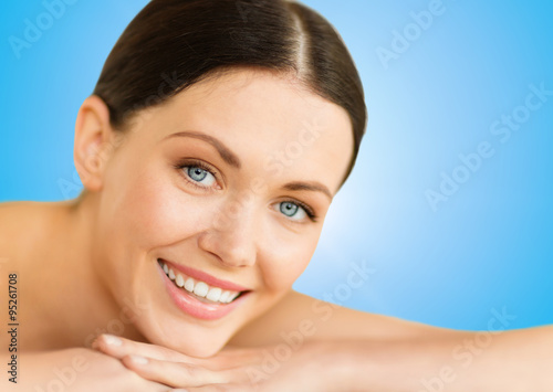 beautiful smiling woman in spa salon