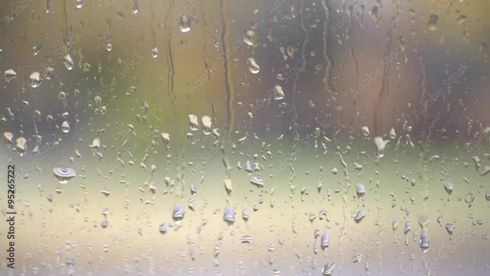 Rain drops on a car window glass Rain drops on a car window glass