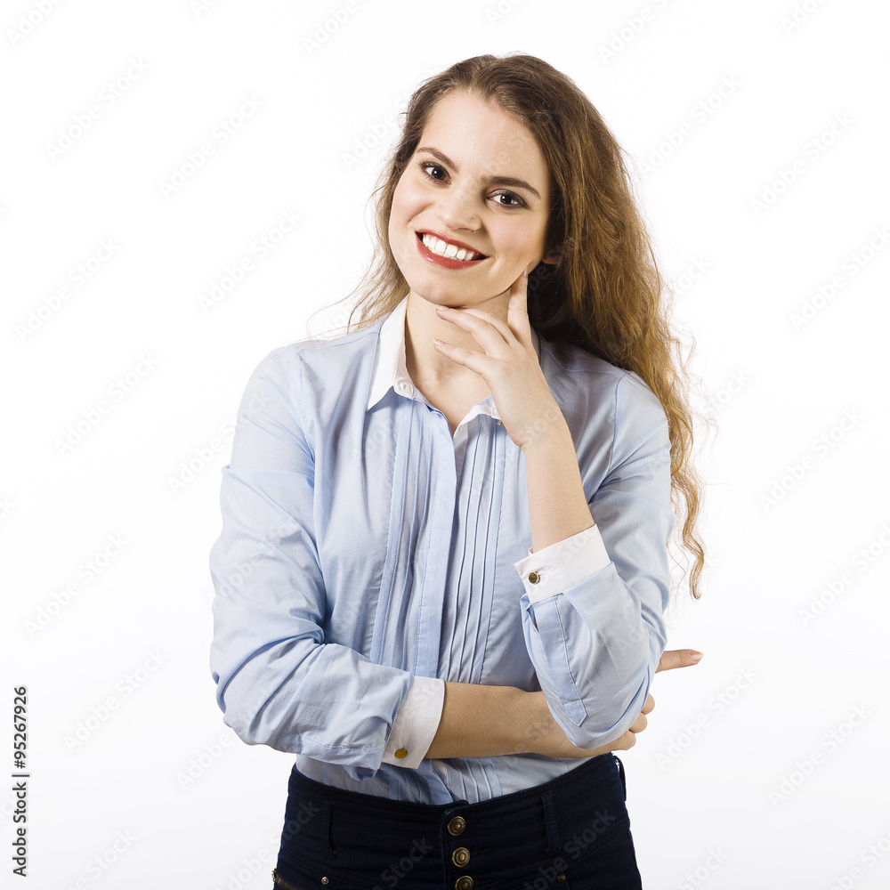 Portrait of a beautiful smiling young woman dressed in a blue sh Portrait of a beautiful smiling young woman dressed in a blue sh