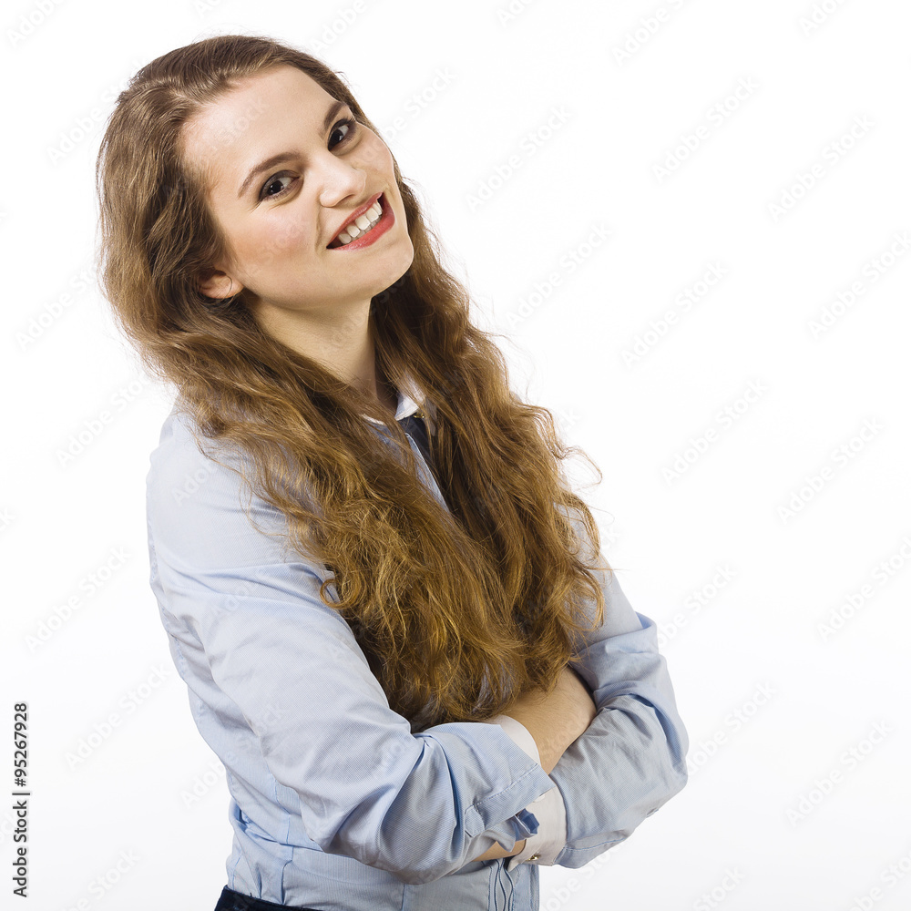Portrait of a beautiful smiling young woman dressed in a blue sh Portrait of a beautiful smiling young woman dressed in a blue sh