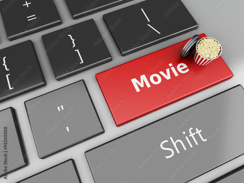 Fototapeta premium 3d Popcorn and film reel on computer keyboard.