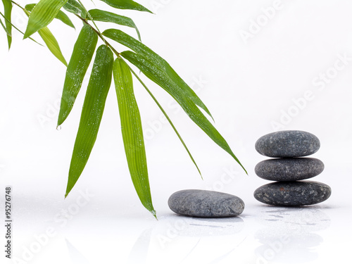The stacked of Stones spa treatment scene and bamboo leaves with