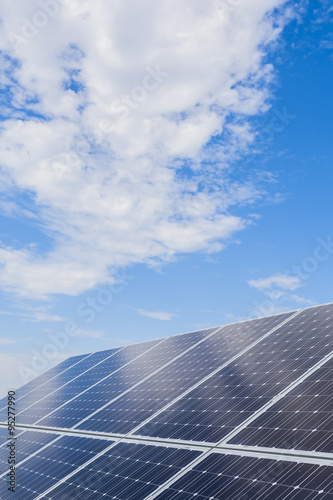 Solar panels against the sky and clouds. Photovoltaics.
