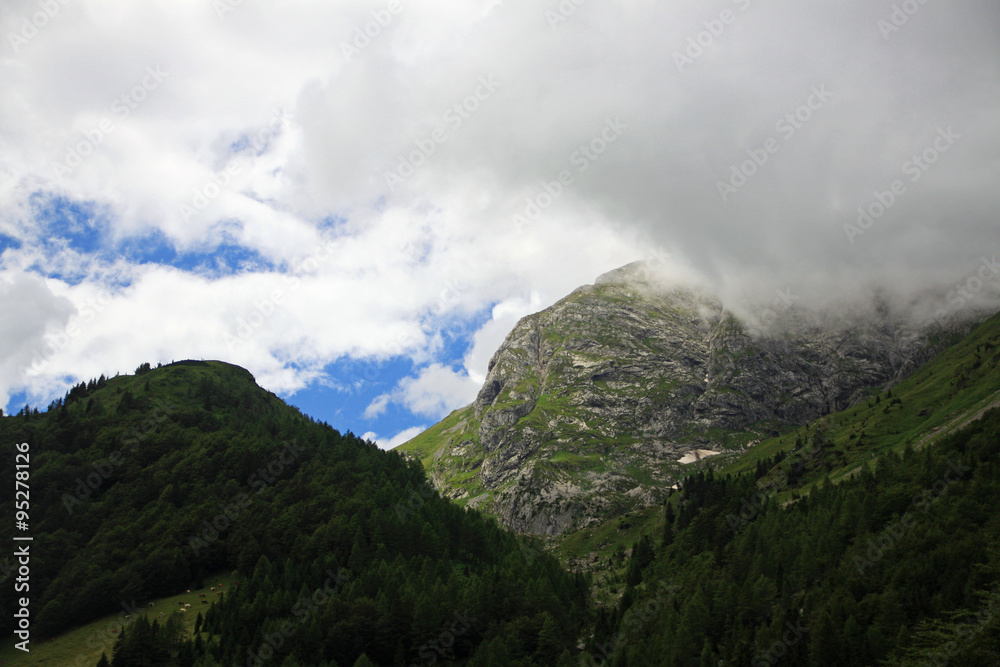 Hills in the clouds, Alps, Austria.