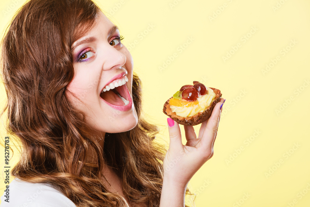 Closeup woman eating fruit cake sweet food Closeup woman eating fruit cake sweet food