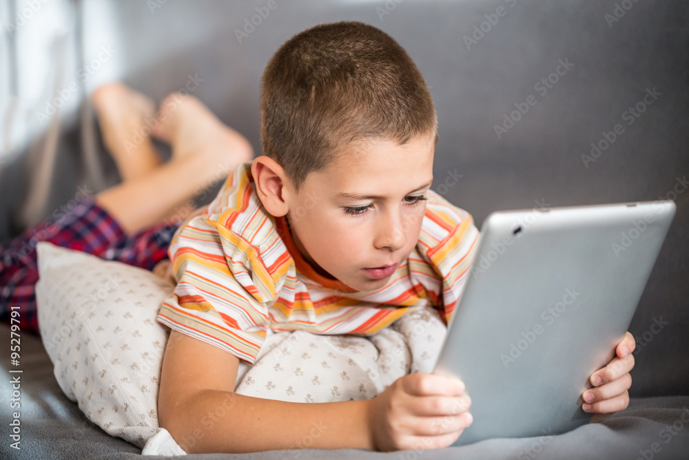 Boy using tablet Boy using tablet