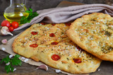 Focaccia with cherry tomatoes and provencal herbs