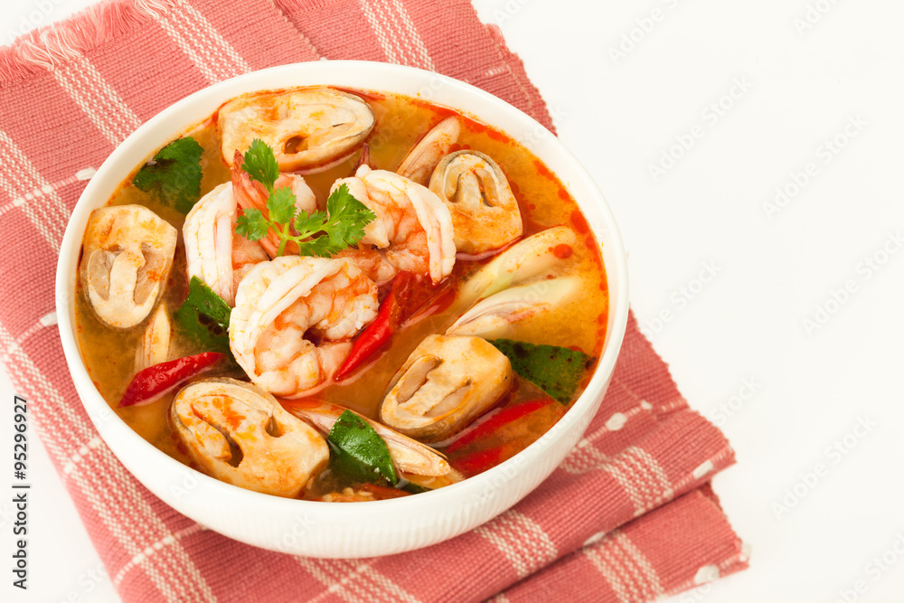 Tom Yum Kung - traditional thai spicy soup with shrimp and mushrooms Tom Yum Kung - traditional thai spicy soup with shrimp and mushrooms