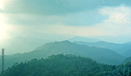 misty mountain hills landscape  layers of mountains with fog