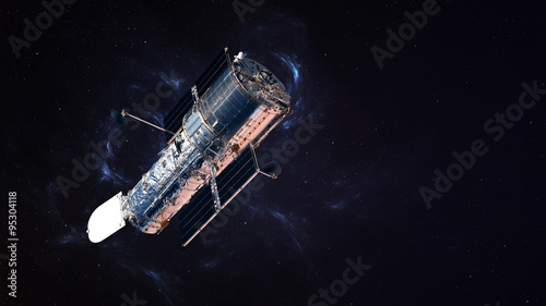 The Hubble Space Telescope in orbit above the Earth. Elements of this image furnished by NASA
