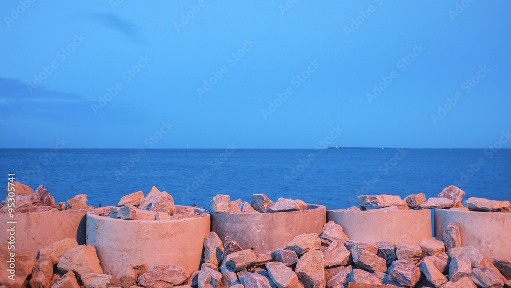 Stone embankment to prevent the waves of the sea. Stone embankment to prevent the waves of the sea.