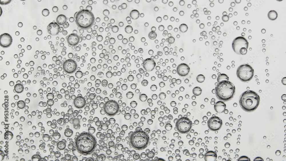 Sparkling bubbles rising in a glass of clean water. Macro close-up 4K UHD 2160p footage.
Sparkling bubbles rising in a glass of clean water. Macro close-up 4K UHD 2160p footage.