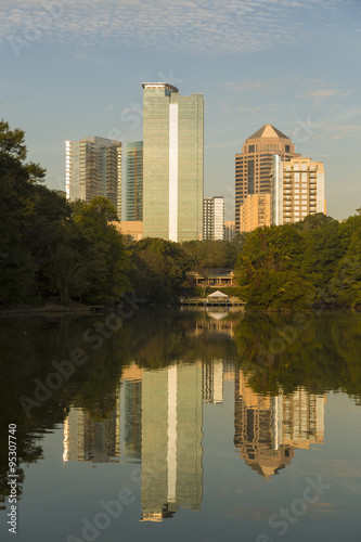Atlanta skyline with water reflections from Piedmont Park  USA