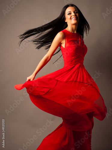 Beautiful dancer wearin red dress