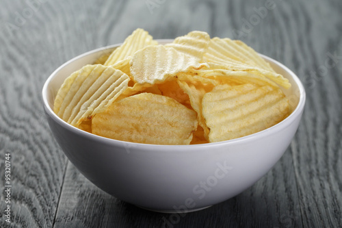 potato chips in white bowl