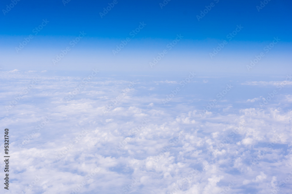 Skyline View above the Clouds from air plane. Sky background Skyline View above the Clouds from air plane. Sky background